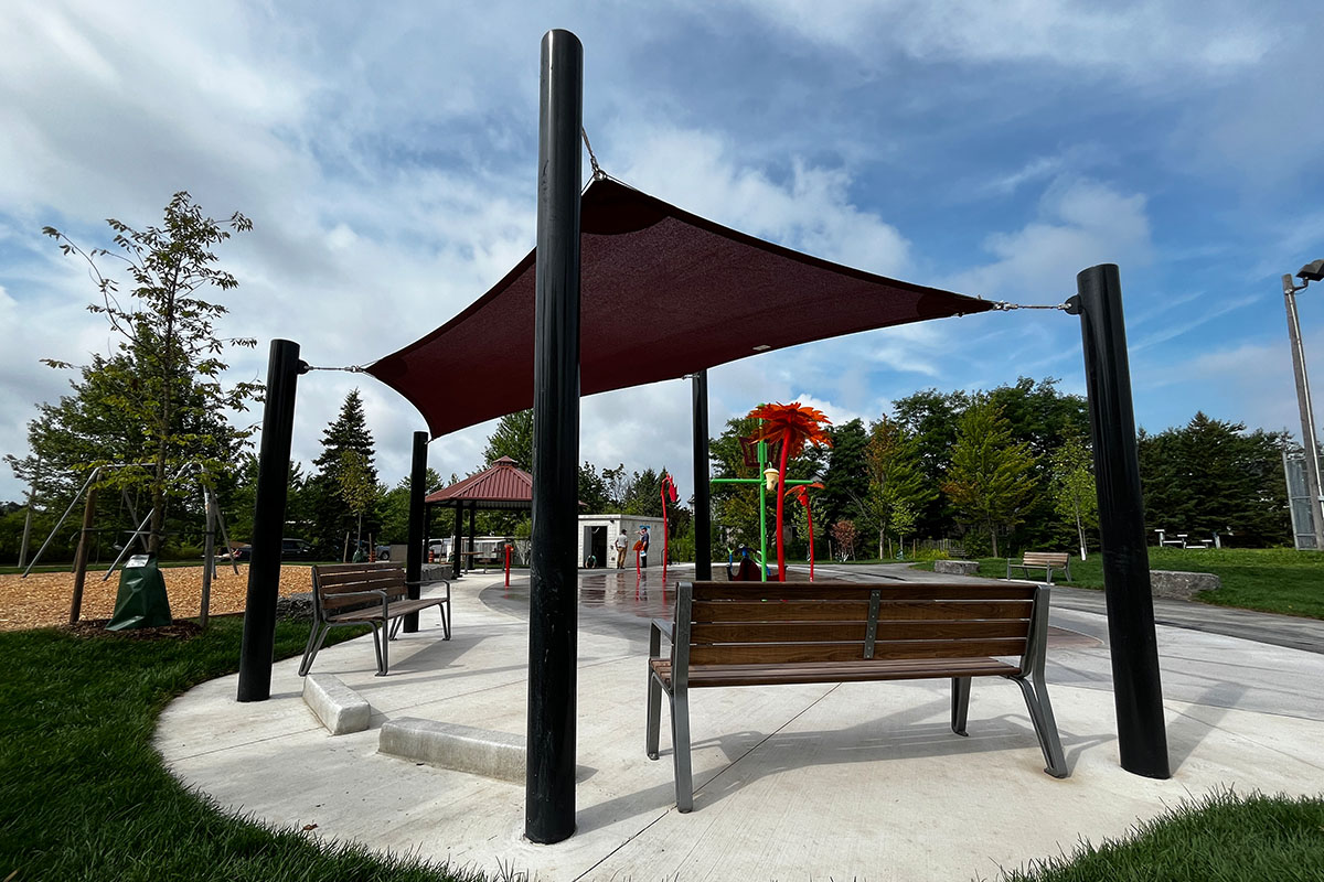 Shade Structures Improve Outdoor Spaces: 4-Post Super Shade Triangle by Sun Shade Co